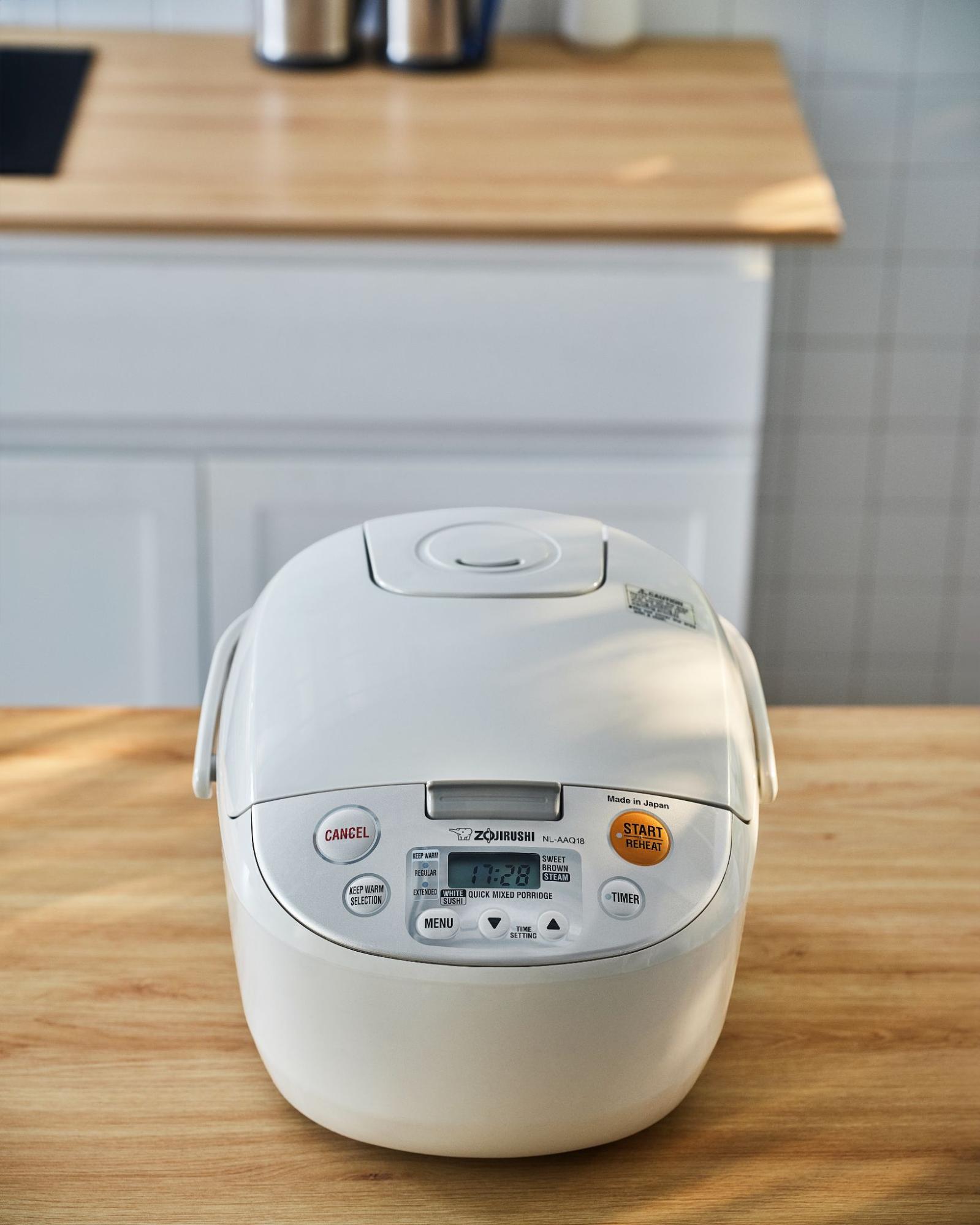 Nồi cơm điện tử Zojirushi NL-AAQ18-CA 1.8L - Màu Be